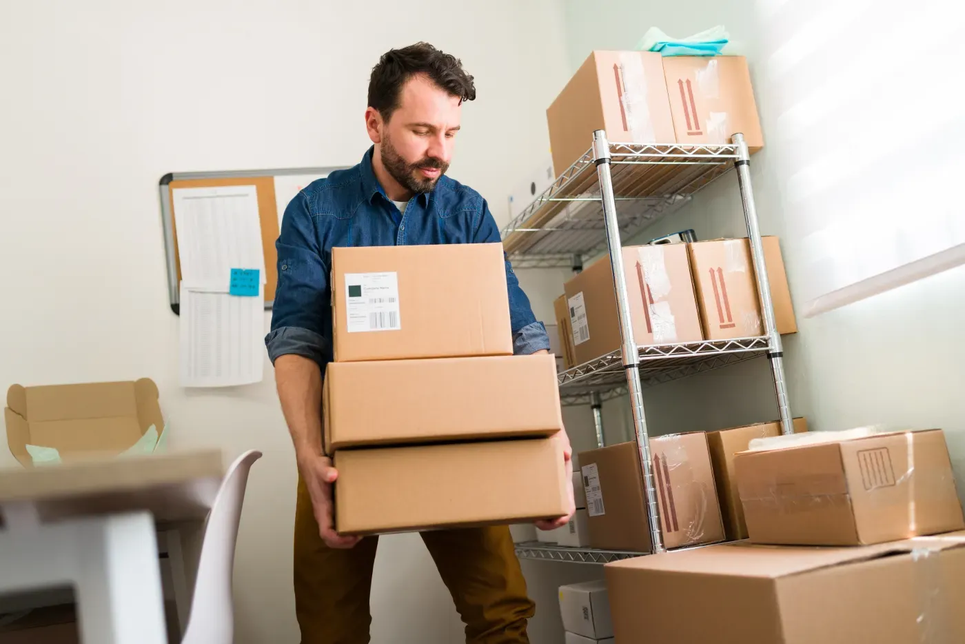Small business owner packing orders for an online store